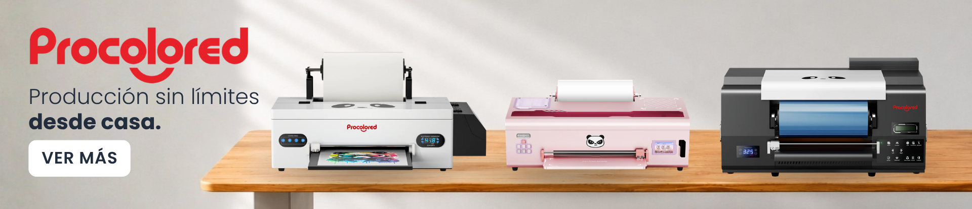 Procolored logo and slogan on left with three printers on a wooden table (white, pink, black) printing a color page from a home setup.