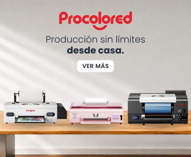 Brand banner showing Procolored logo with the tagline 'Producción sin límites desde casa' and three printers on a wooden table; a 'Ver Más' button is centered below.